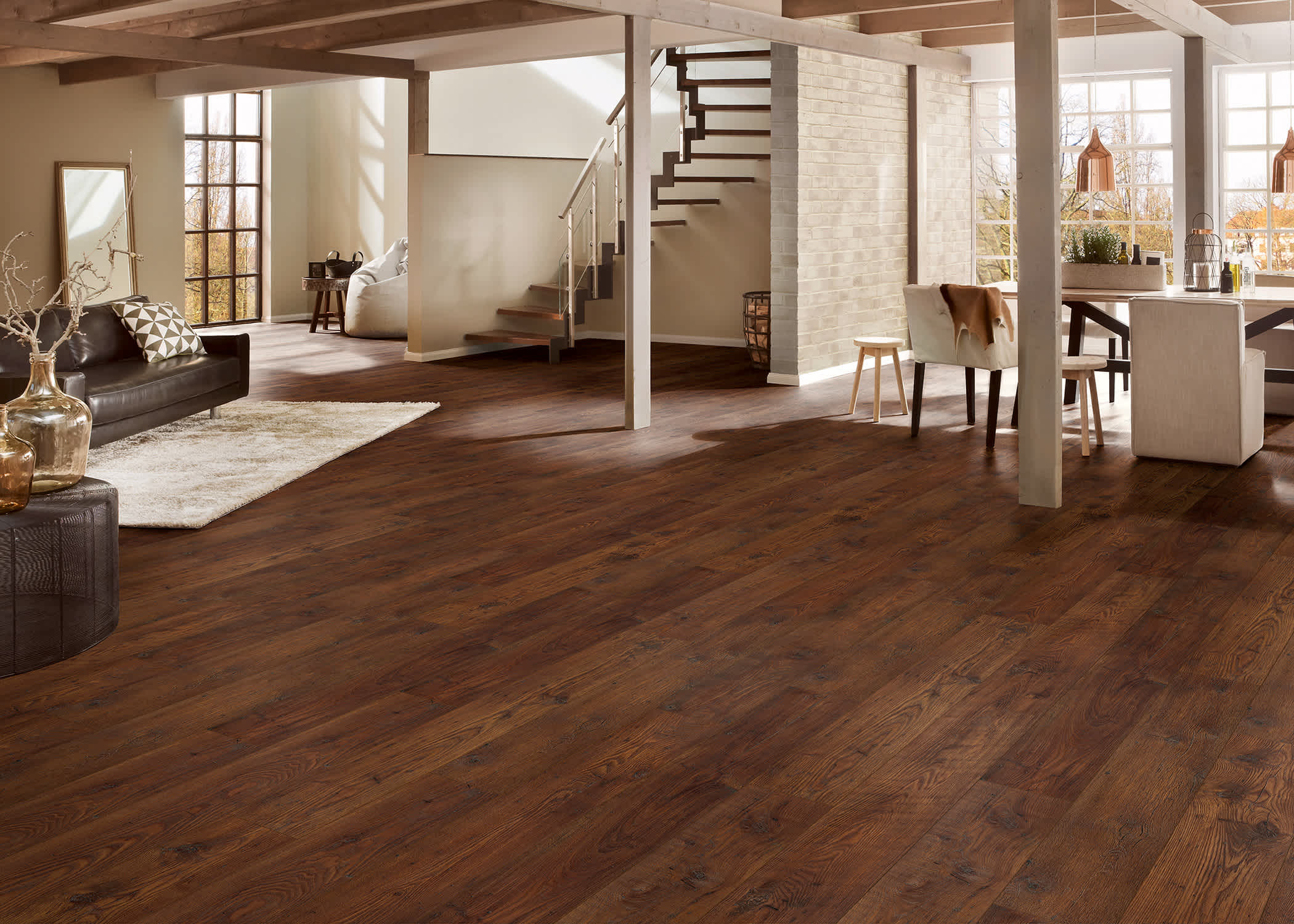 Whiskey Barrel Oak w/ pad Waterproof Laminate Flooring installed in a living room