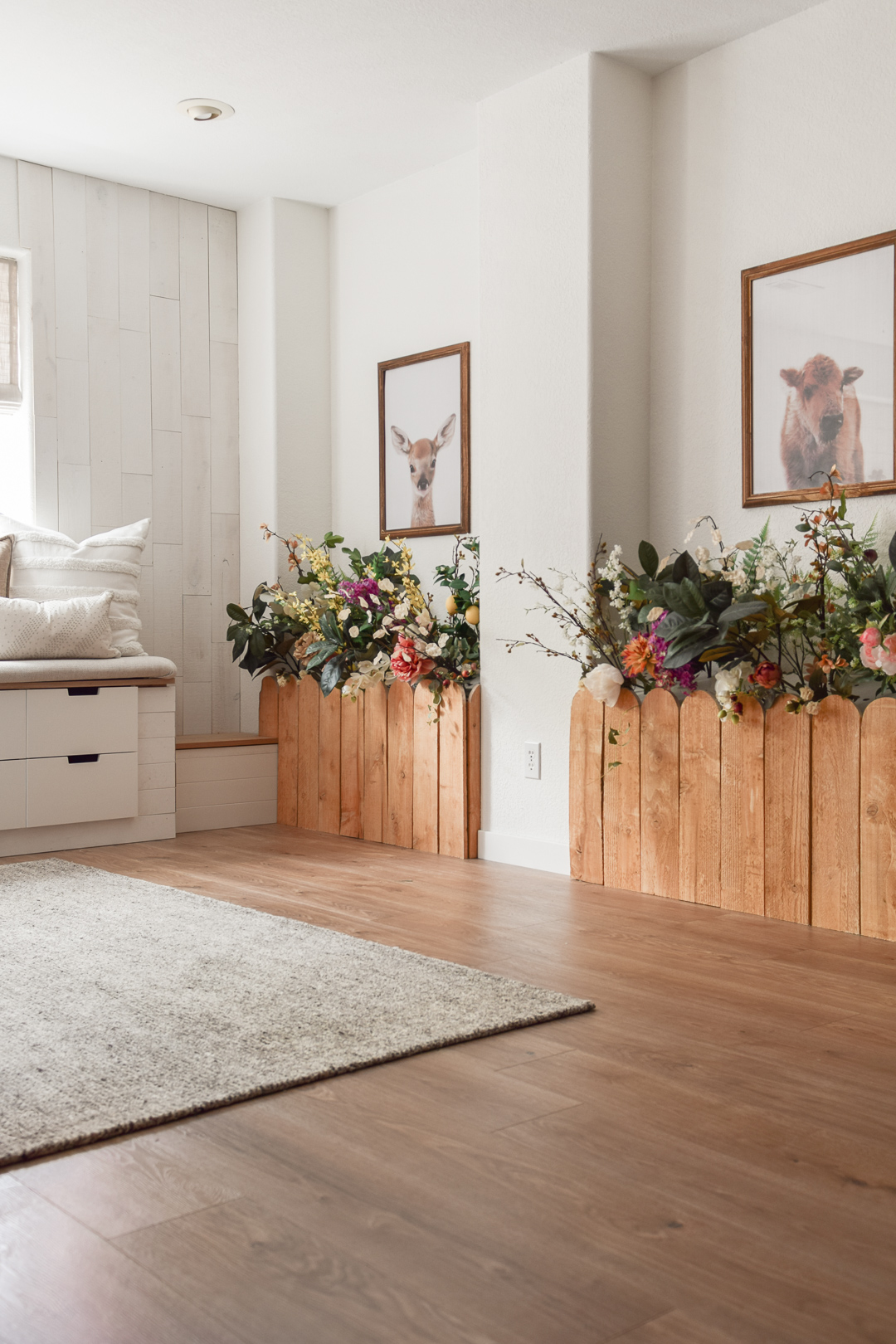 basement after remodel with plant decor and art