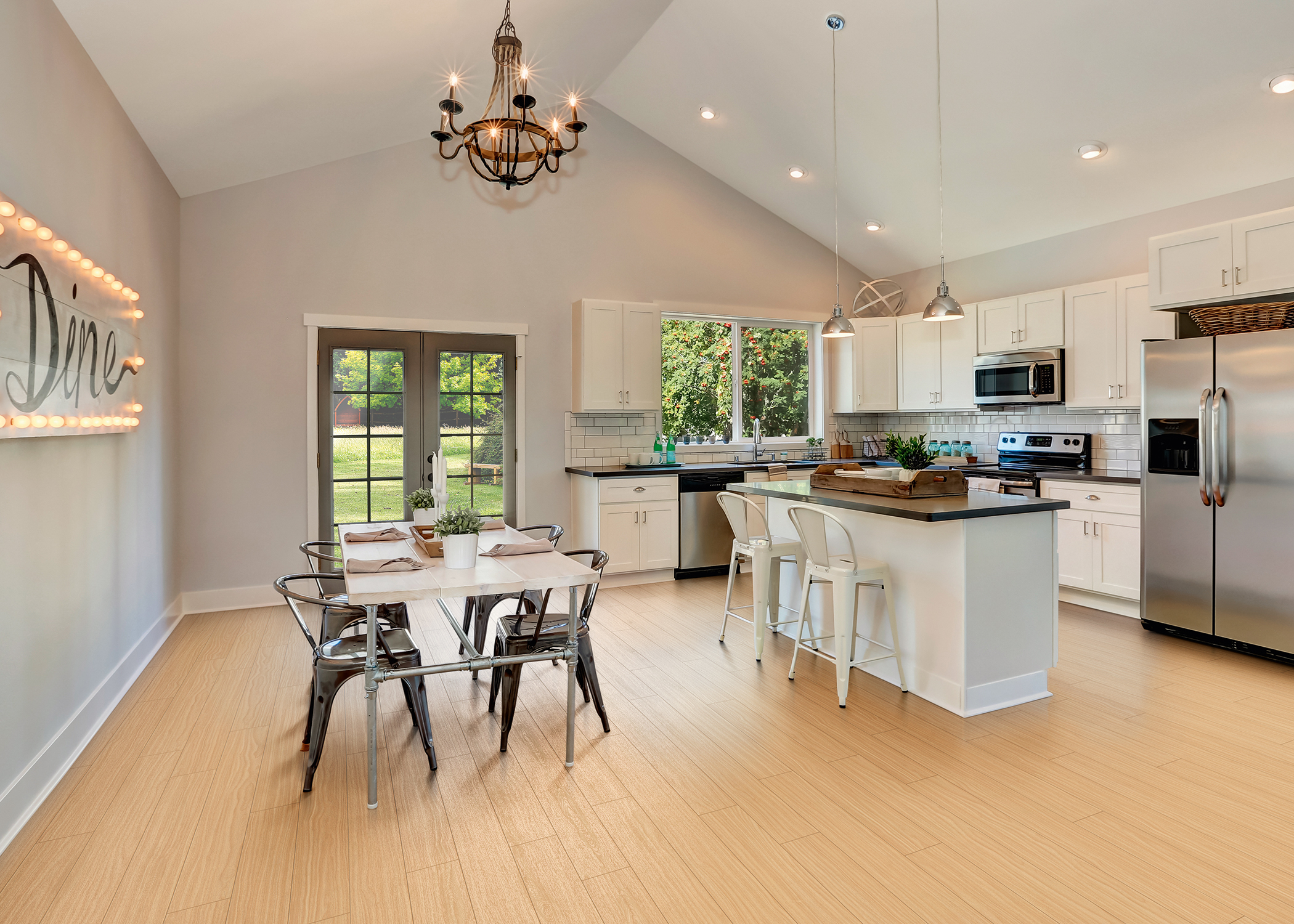 kitchen withCoreLuxe 4mm w/pad Heartland Red Oak Waterproof Rigid Vinyl Plank Flooring