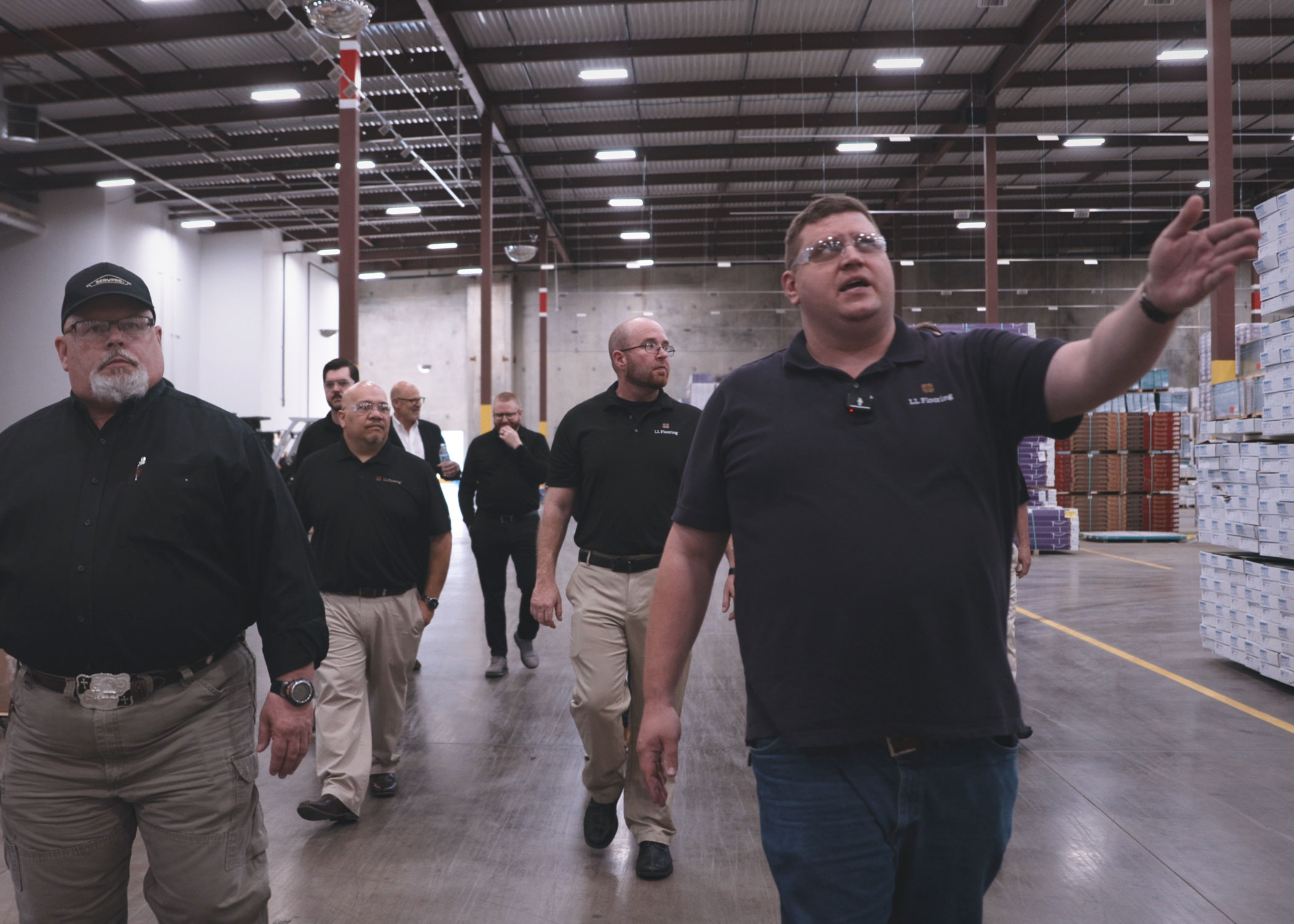 ll flooring pro associates and pro partners touring inside of dallas fort worth distribution center