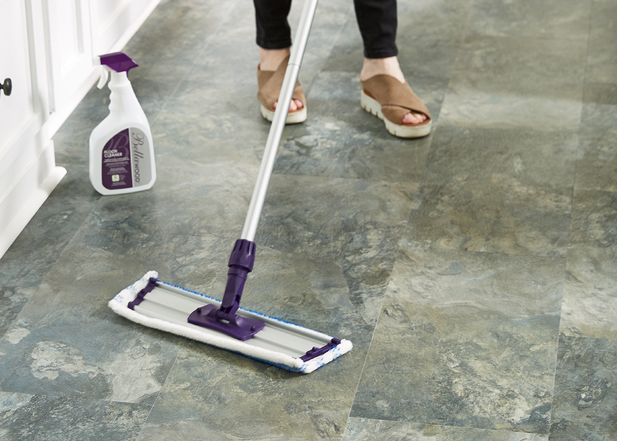 bellawood aluminum mop and spray bottle being used on stone-look vinyl tile flooring