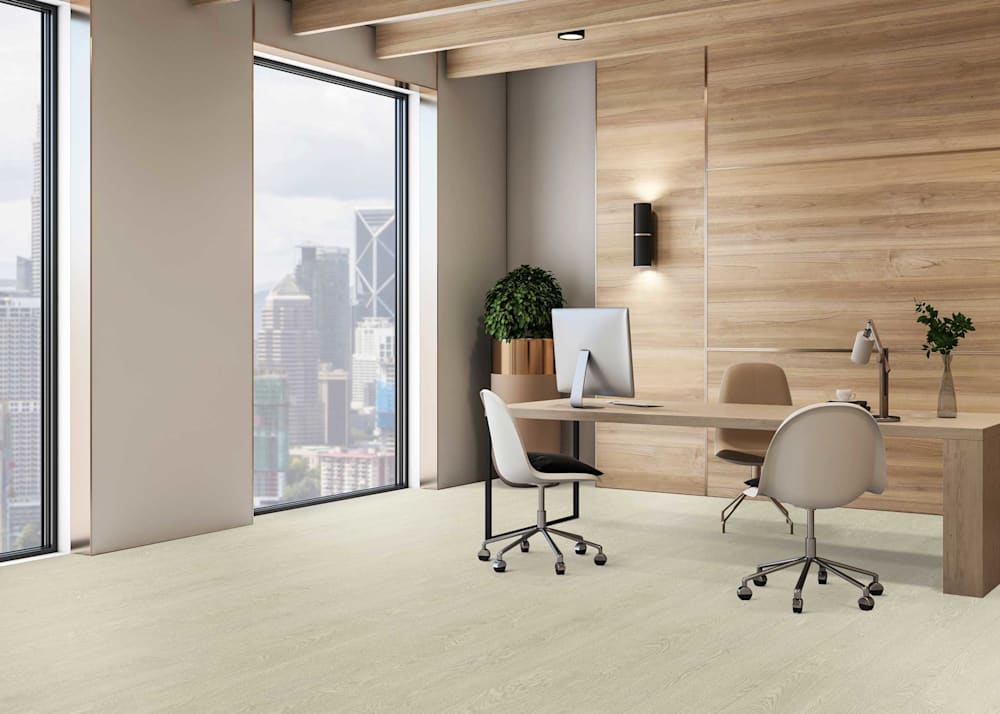 3mm Athens Oak Waterproof Rigid Vinyl Plank Flooring in office with medium wood tone floor to ceiling wall and wood desk with three chairs